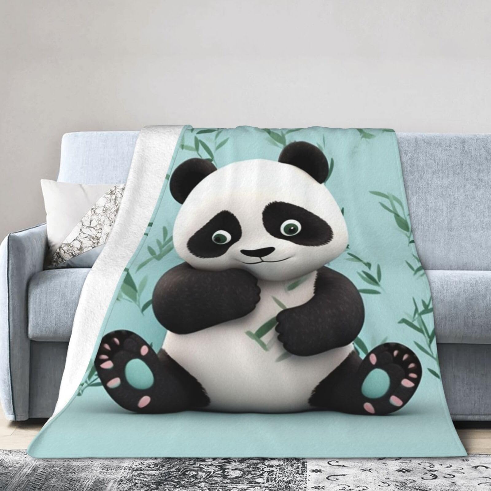 Couverture panda pour éliminer le froid sur votre lit ou canapé