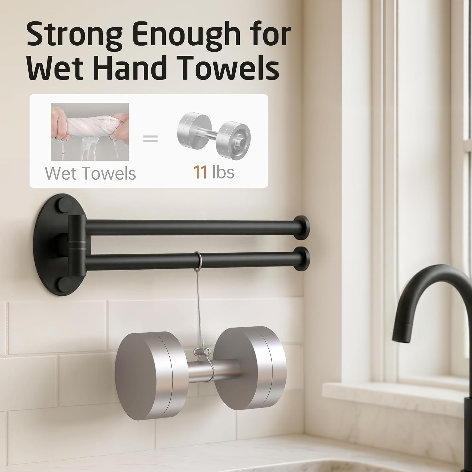 Towel bar holding weights, demonstrating its strength for wet hand towels.