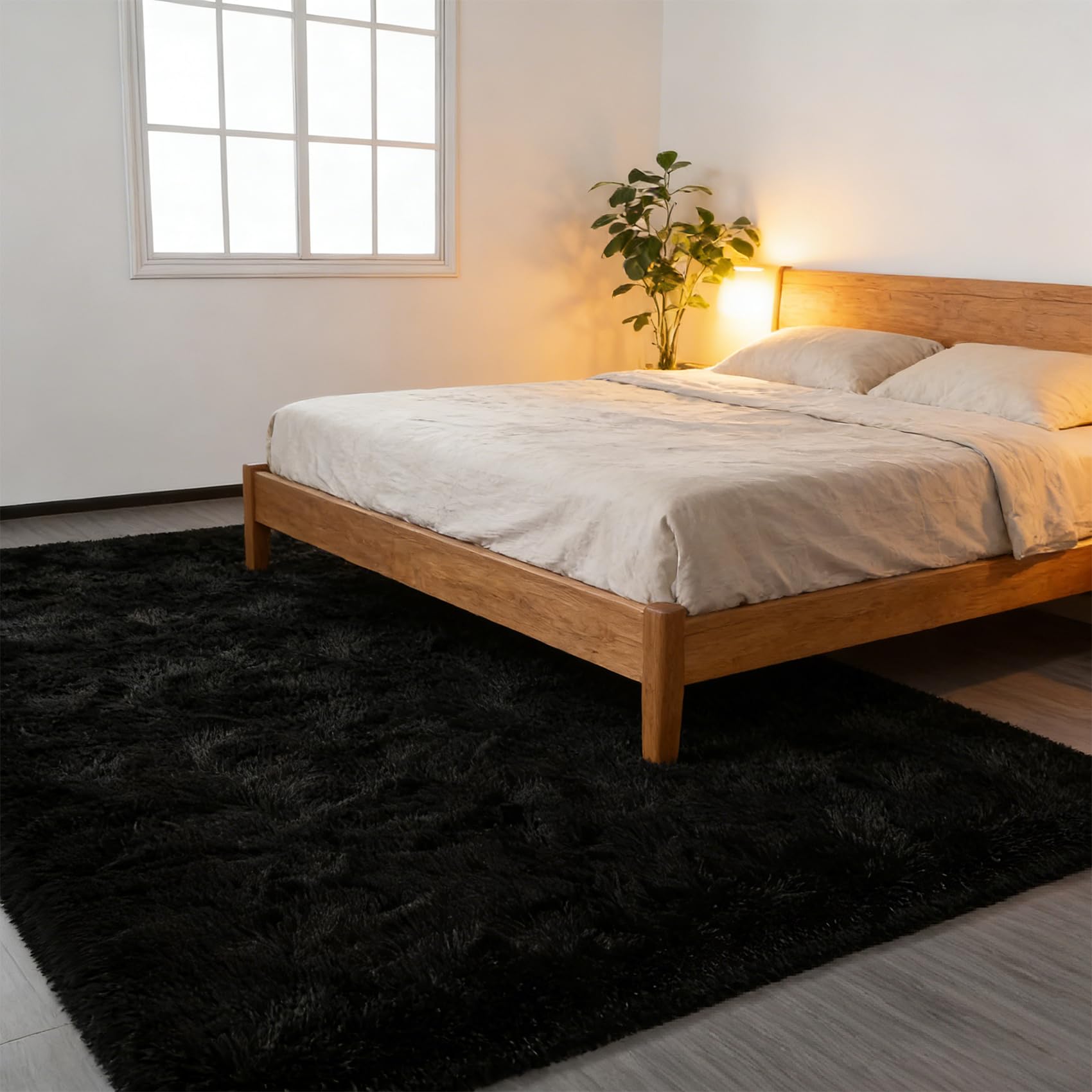 Tapis moelleux noir 140x240 cm lavable pour supprimer la sensation de sol froid dans la chambre