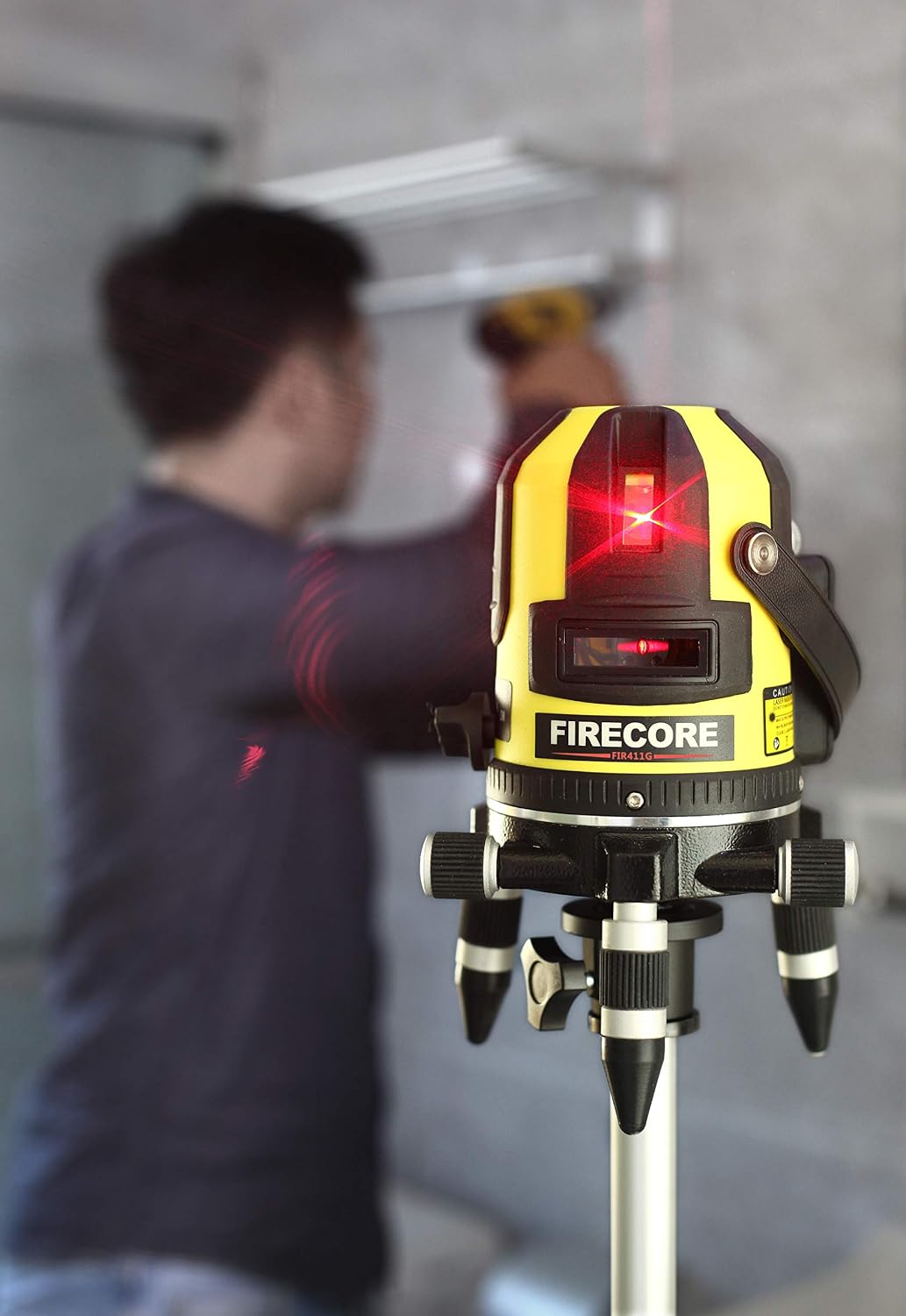 Firecore FIR411R Laser Level projecting red lines on a wall
