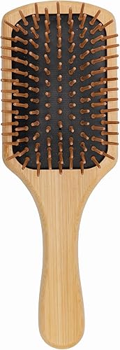 Double-Sided Pet Grooming Rake — shown in a real home setting for scale