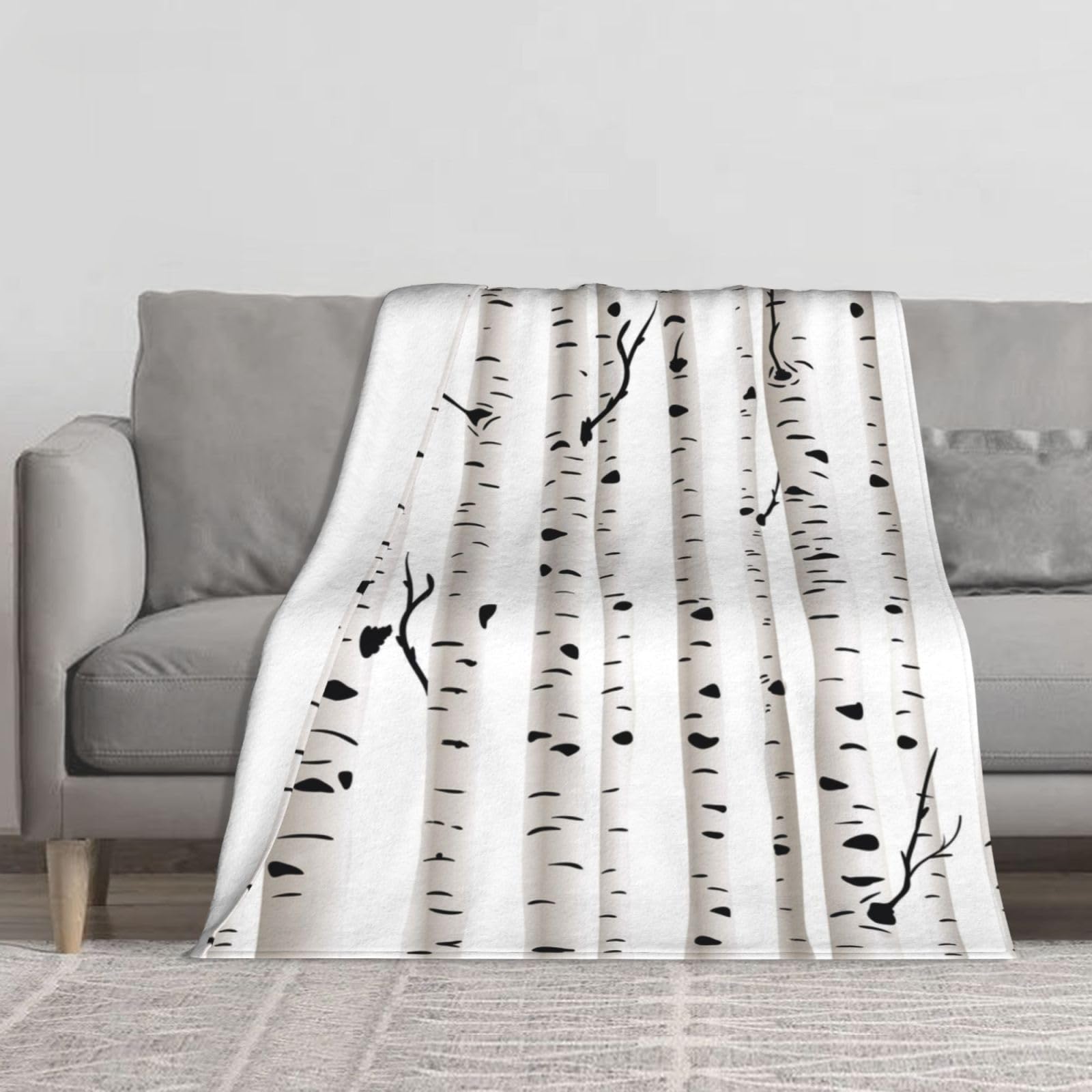 Couverture flanelle bouleau pour vos soirées cocooning au salon