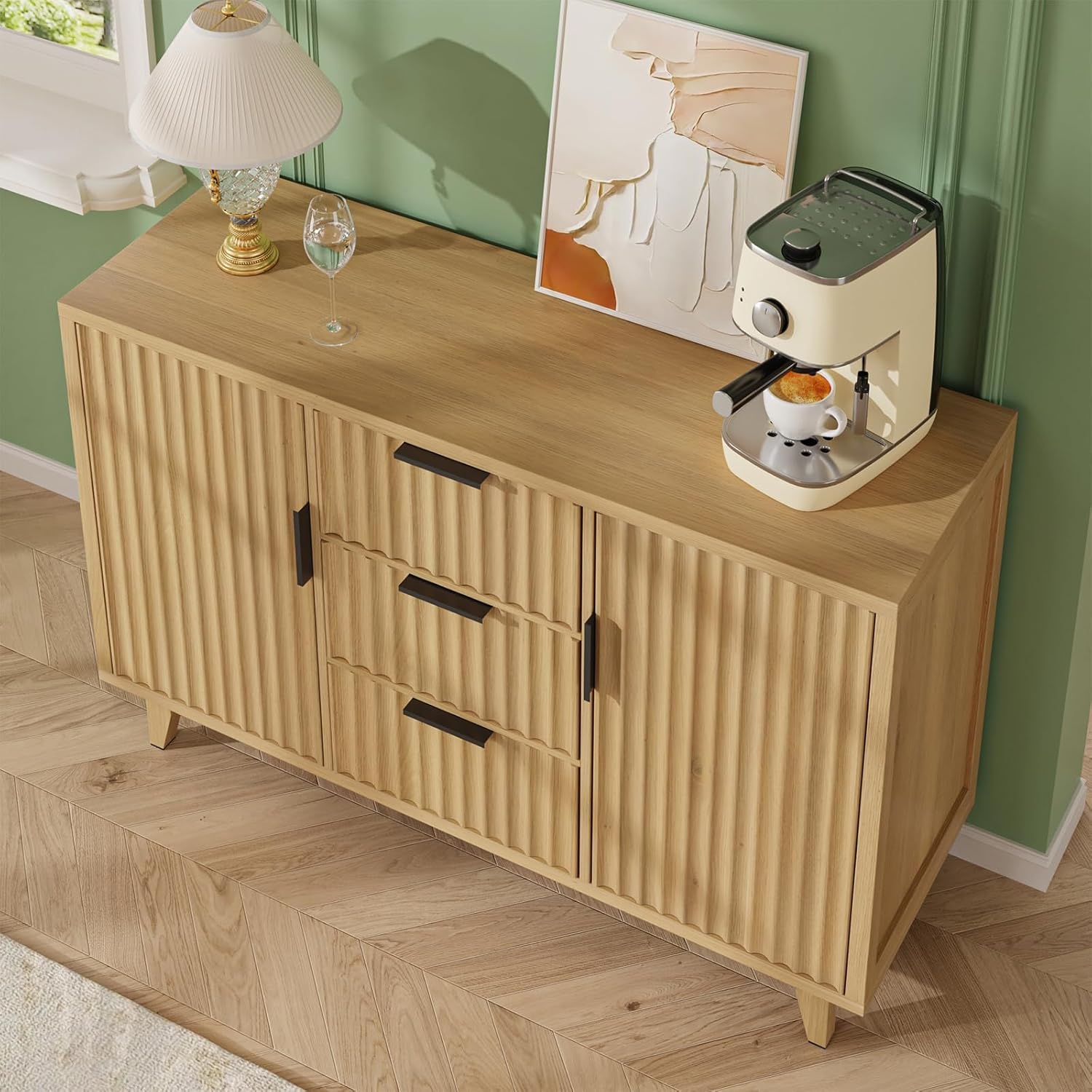 A FiveWillowise storage cabinet used as a TV stand in a living room, with a television on top and decorative items.