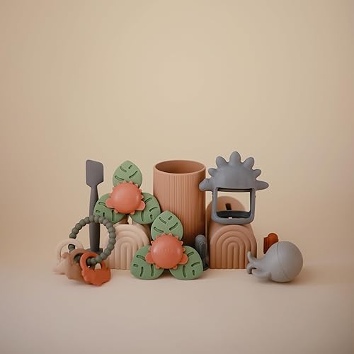 Miniatura 7 de mushie Juguete giratorio de succión Dino  Juguetes sensoriales para niños pequeños para baño y juego