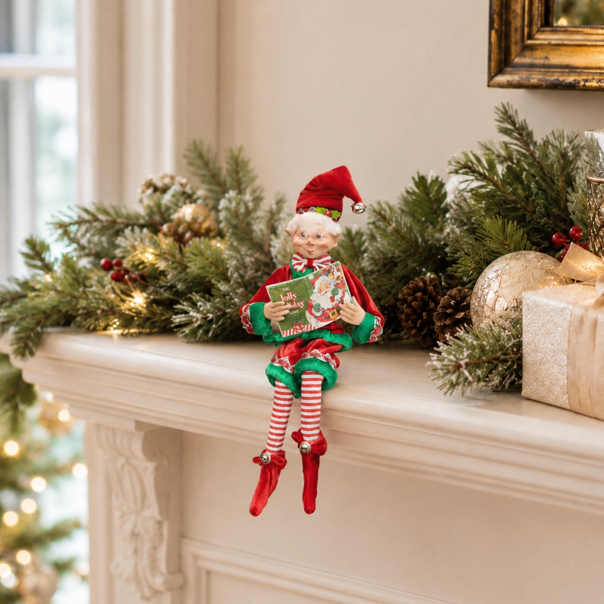 RAZ Imports Elfo de Navidad Posable, 16 Pulgadas de Alto, Traje de Terciopelo Rojo y Verde con Libro de Papá Noel, colección navideña de los Juegos de Reno 2019
