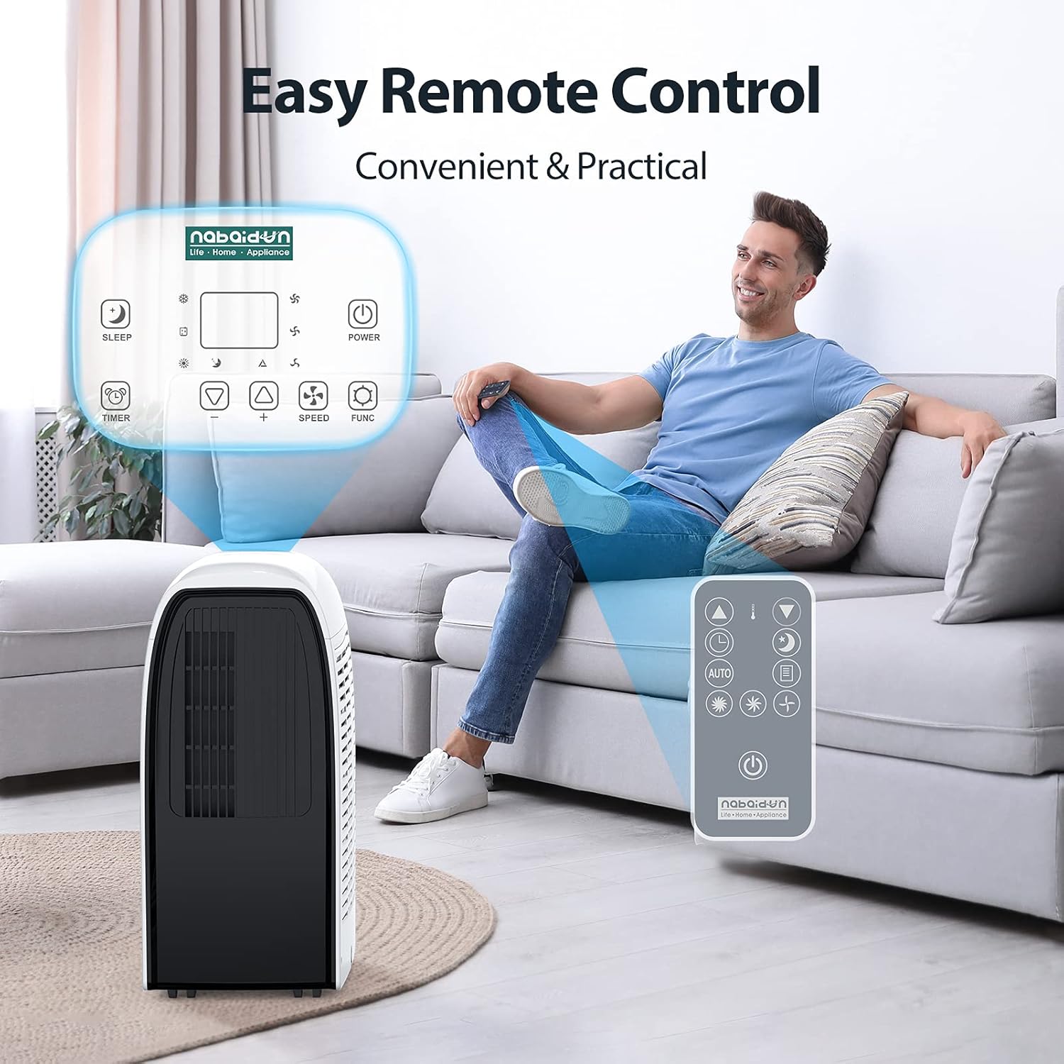 Man relaxing on a couch using the remote control for the portable AC unit