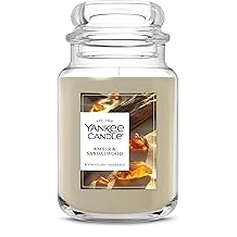 Yankee Candle Amber & Sandalwood, Scented Candle, 22oz Large Jar with up to 150 Hour Burn Time, Giftable