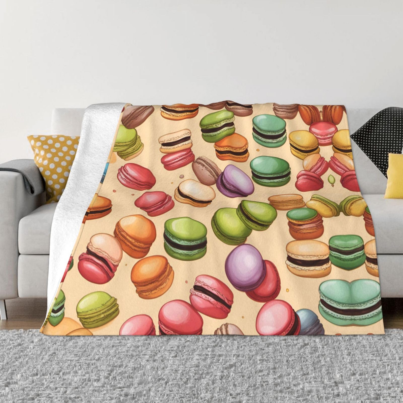 Couverture polaire cadeau idéal imprimé macaron pour une ambiance douce et chaleureuse