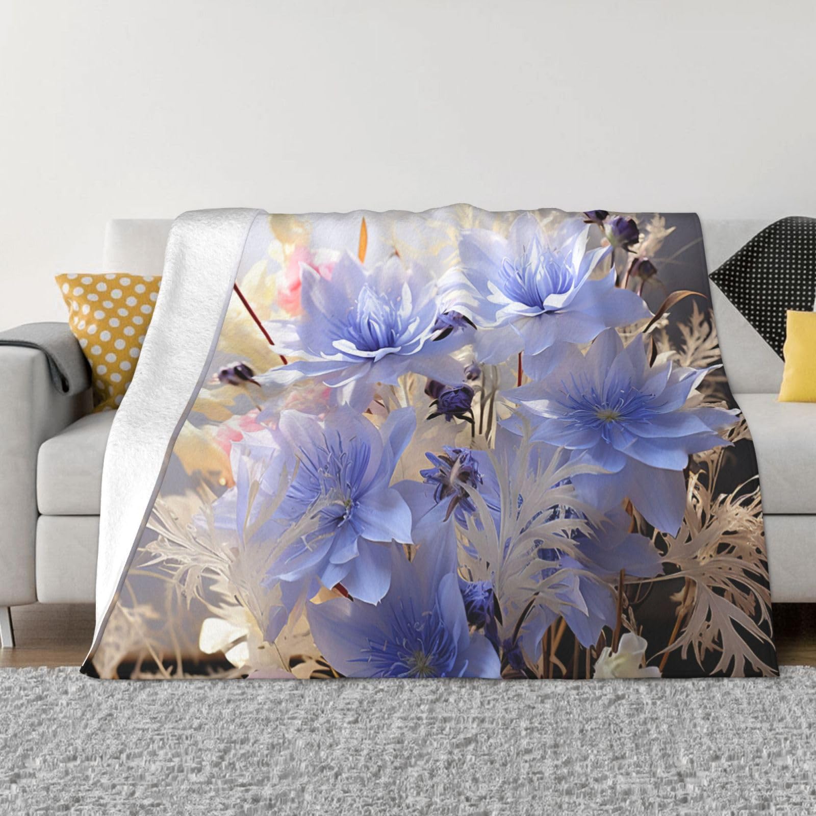 Couverture en peluche douce bleuets pastel pour vos soirées canapé