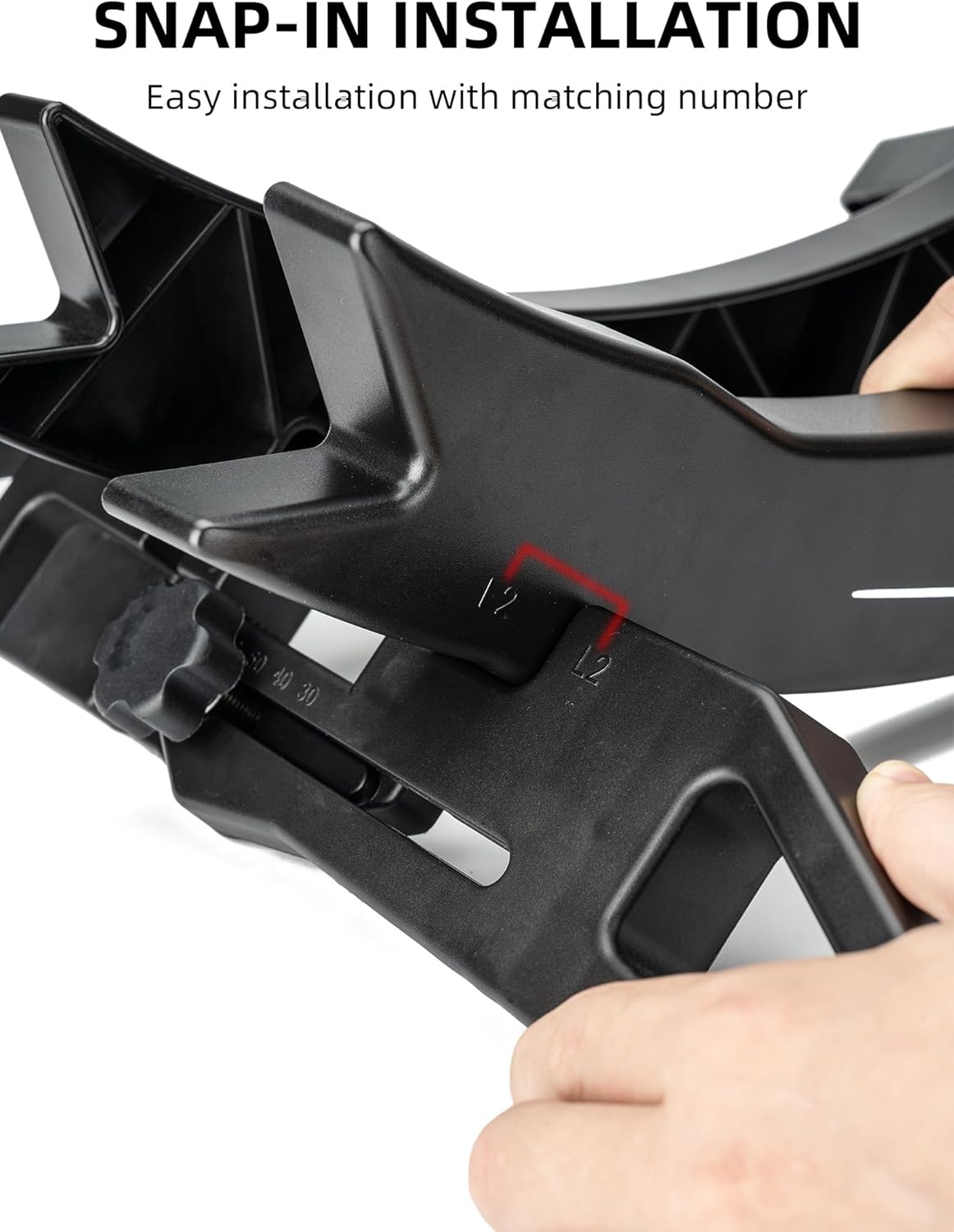 Close-up image showing hands performing snap-in installation of the bike stand components, with matching numbers L2 visible.