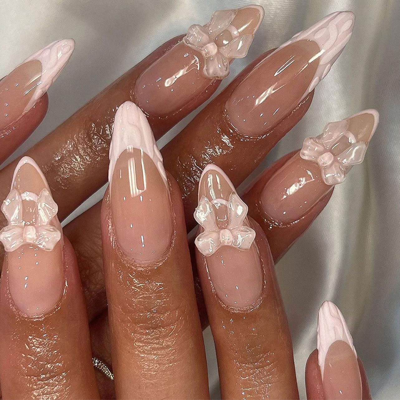 GlamRays 24 Piece French Tip Press on Nails Medium Sized Cute Fake Almond Stick on Nails with Pink Bow Decorations Glossy Nude Full Cover Art