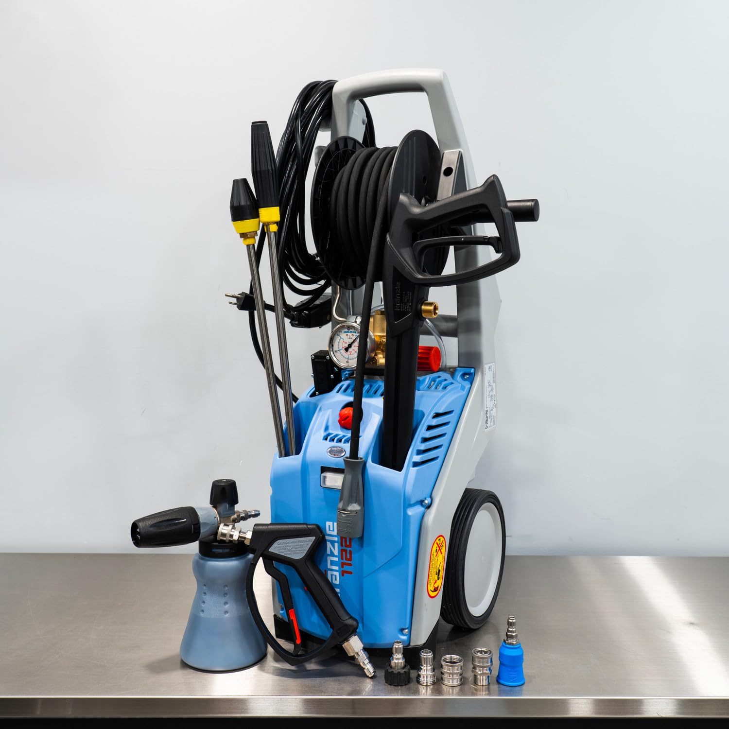 Kranzle K1122TST Pressure Washer unit with hose reel and accessories.