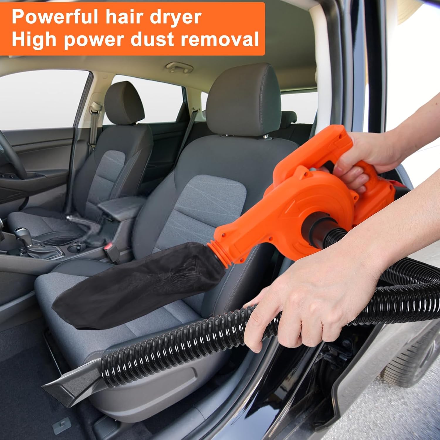 A person using the SamFansar 2-in-1 tool in vacuum mode to clean the interior of a car, specifically the car seats, with the dust collection bag attached.
