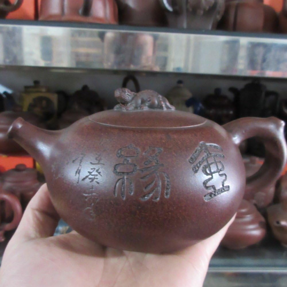 Unusual / World Brand China Yixing teapot The Master made