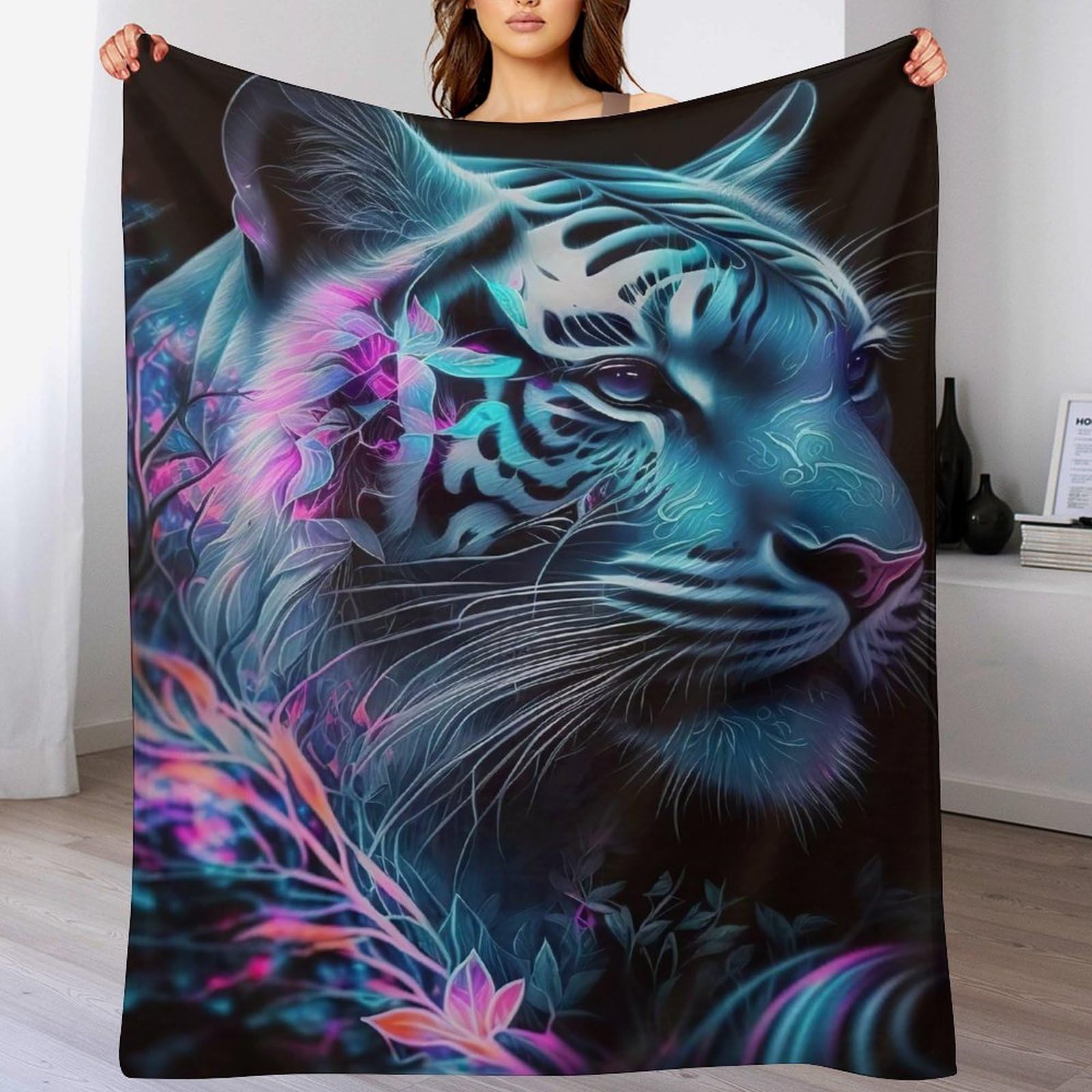 Couverture tigre douce sur le canapé pour vos soirées cocooning au balcon