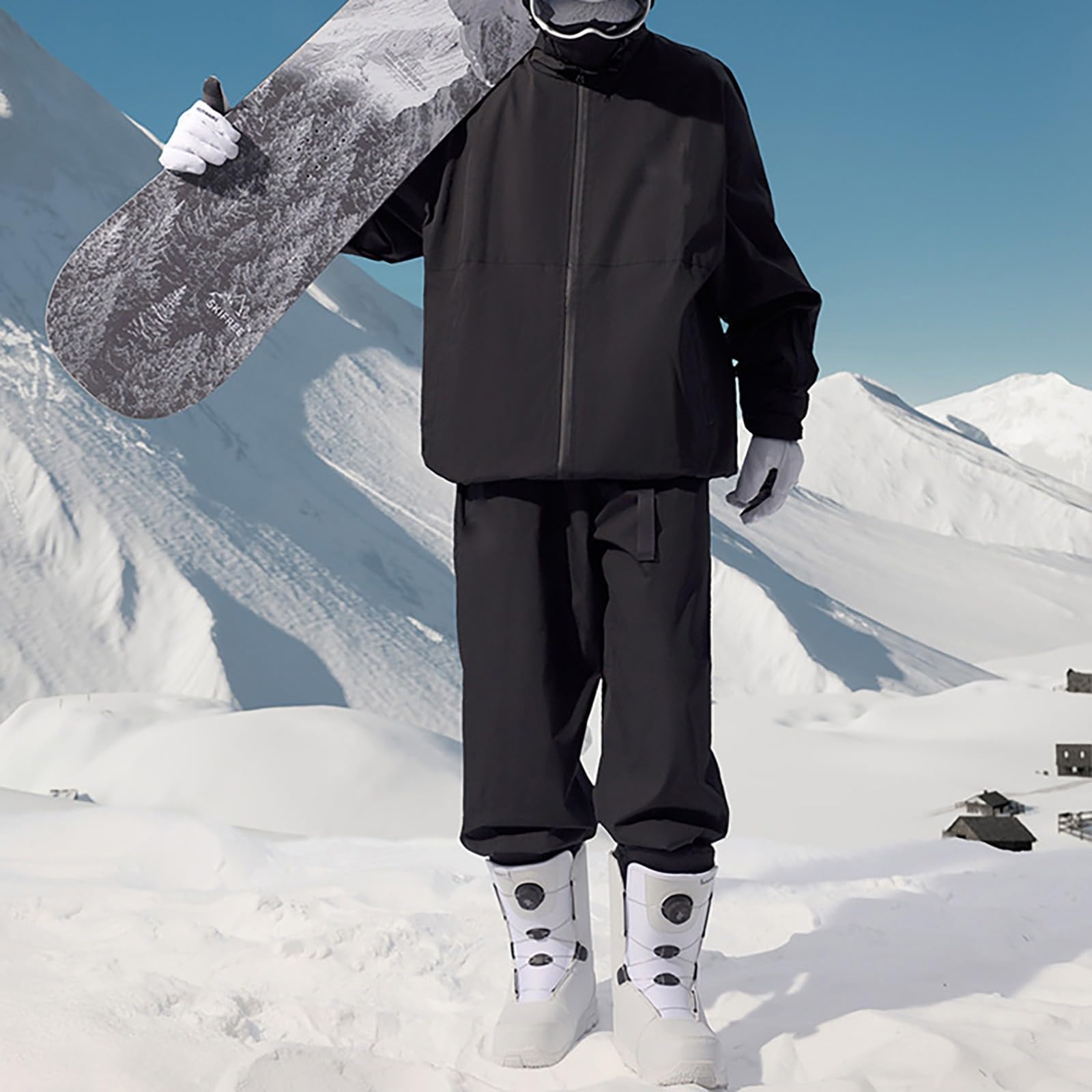 Conjunto térmico de dos piezas para esquí y deportes al aire libre: chaqueta y pantalón con cuello alto, ideal para climas fríos.
