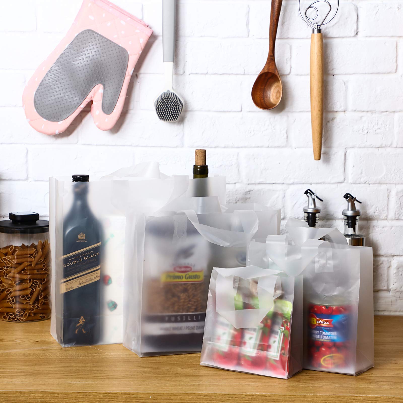 Weewooday 100 Pieces 4 Different Sizes Frosted Plastic Bags with Handles for Small Busines Clear Shopping Bags Take out Gift Bags with Cardboard Bottom (Clear)