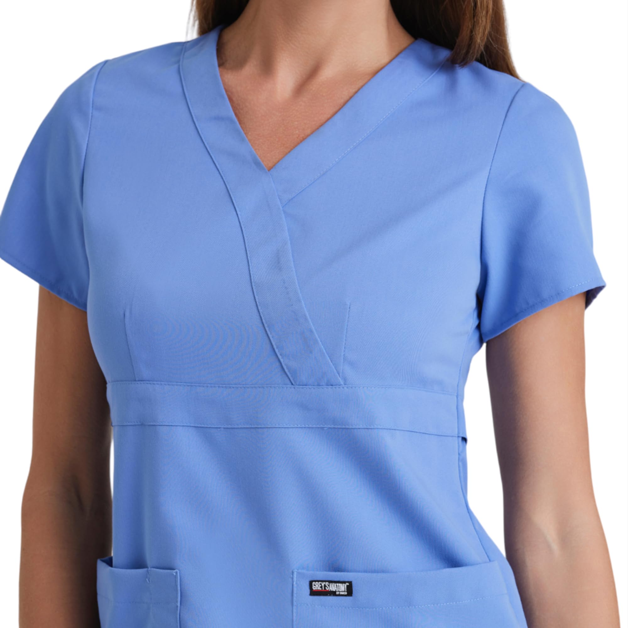 Grey's Anatomy - Chaqueta de uniforme médico para mujer junior con cuello cruzado y tres bolsillos