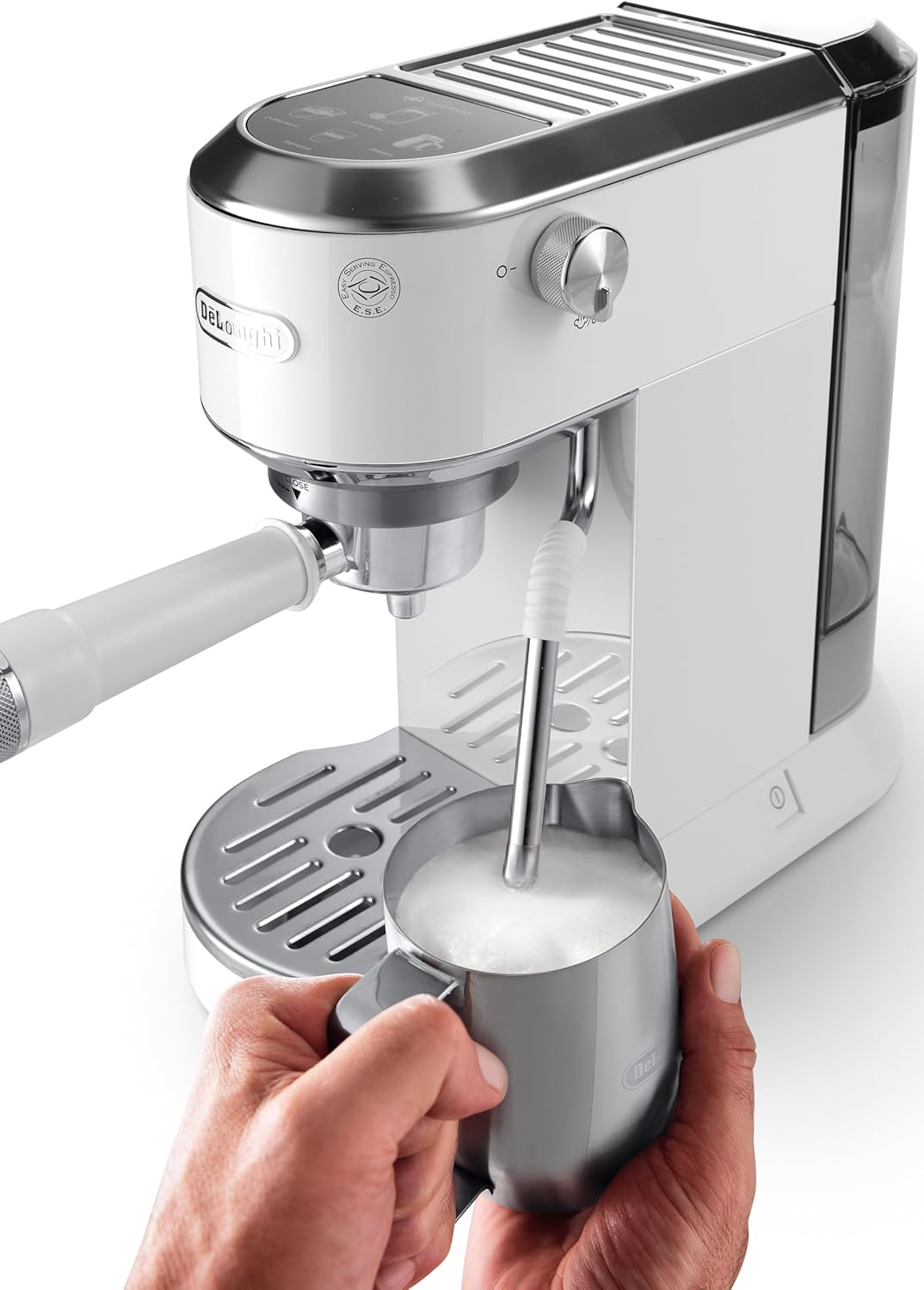 De'Longhi Dedica EC890.WI steam wand frothing milk in a pitcher