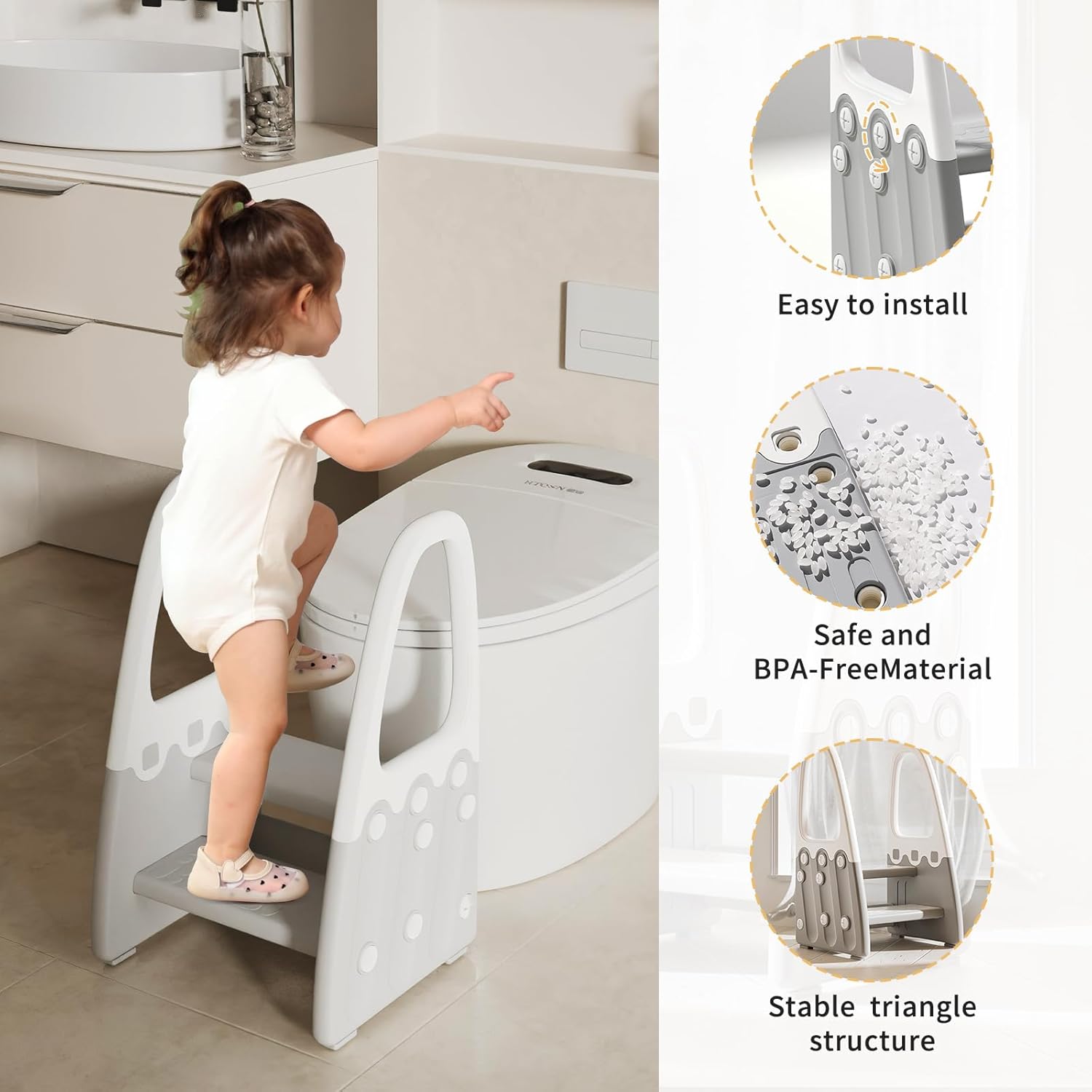 Toddler using the Mangohood two-step stool to reach a kitchen counter.