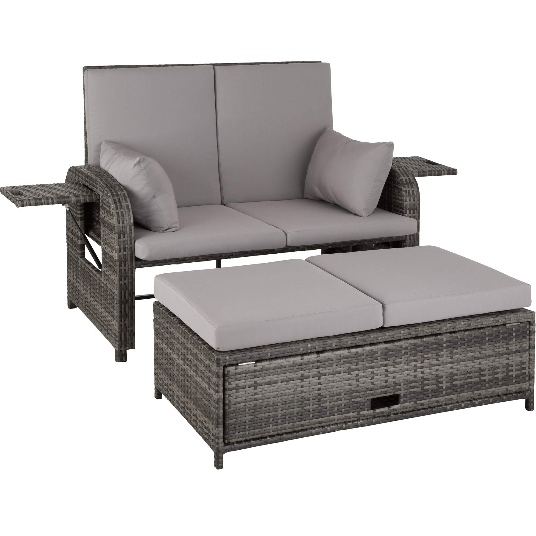 Overall view of the tectake Rattan Lounge Bench Kreta in a garden setting, showcasing its design and functionality as a lounge area.