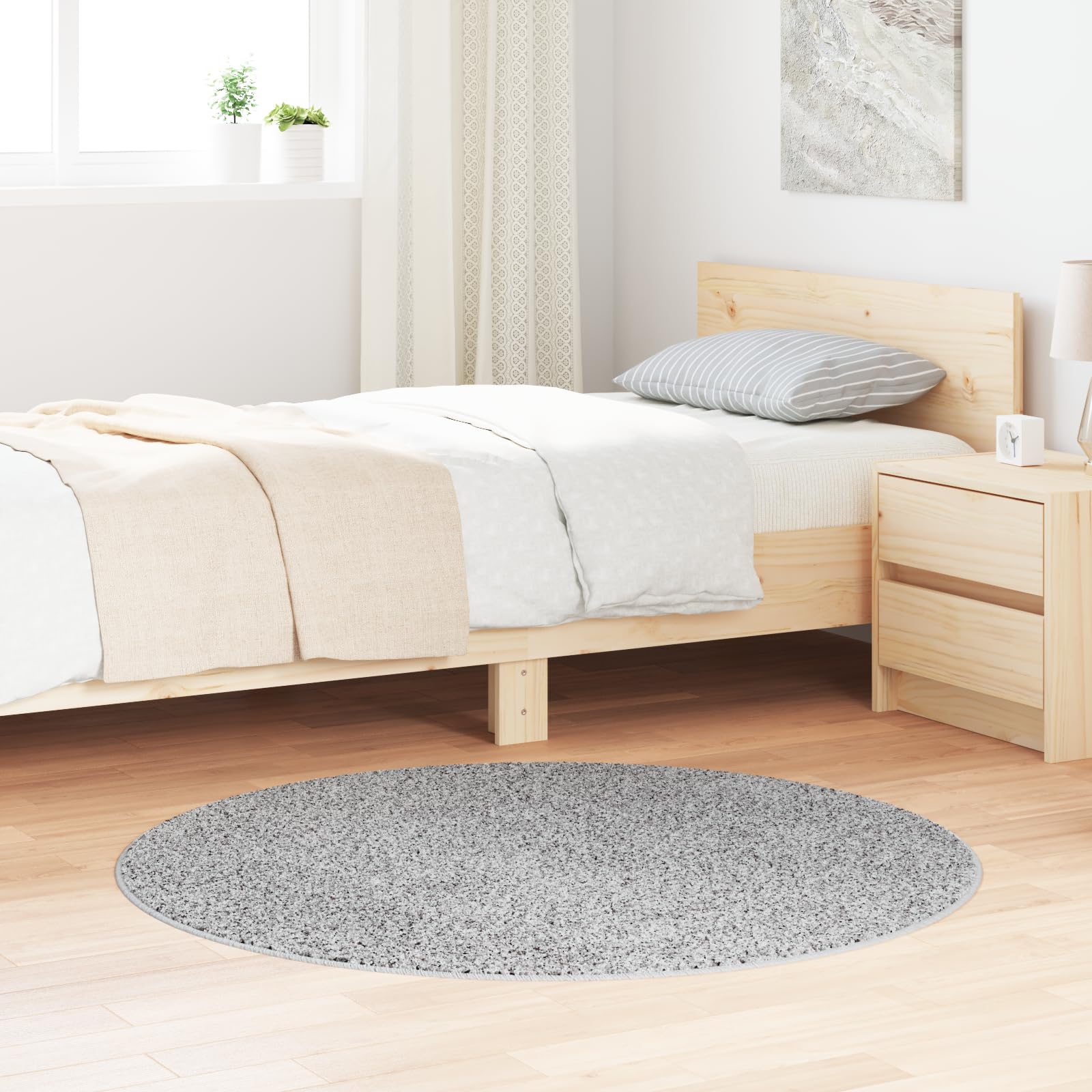 Tapis rond à poils longs antidérapant pour sécuriser l'entrée et le salon familial