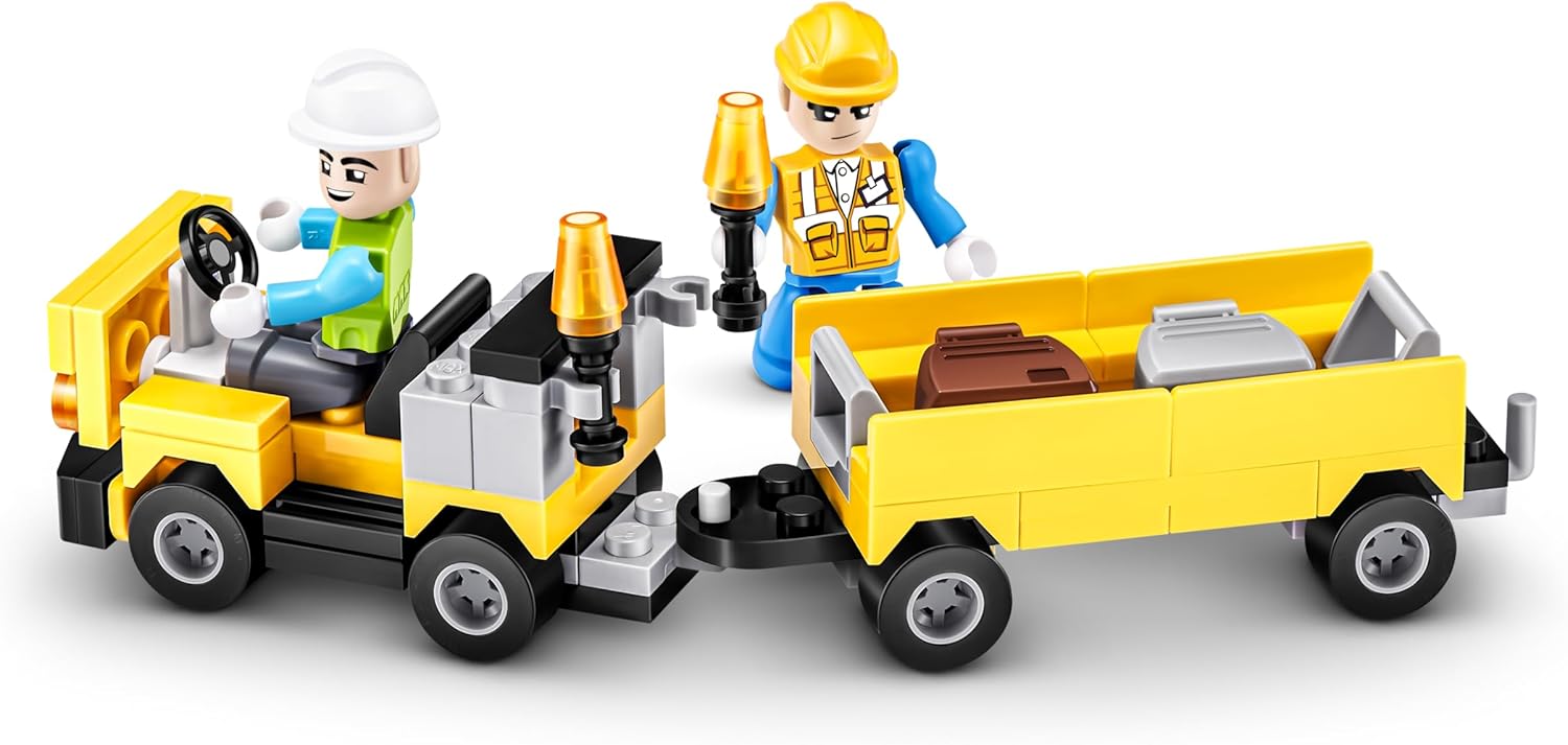 Max Build More luggage truck pulling a trailer with luggage.