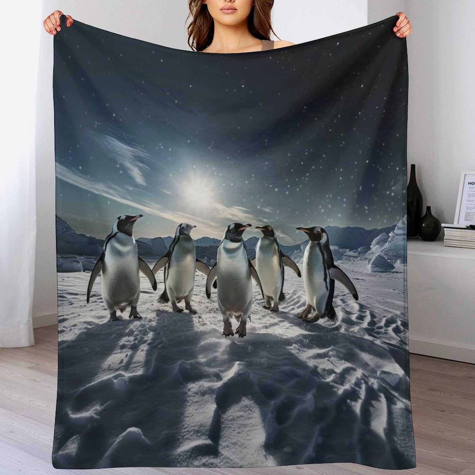Couverture pingouins contre le froid hivernal sur votre lit