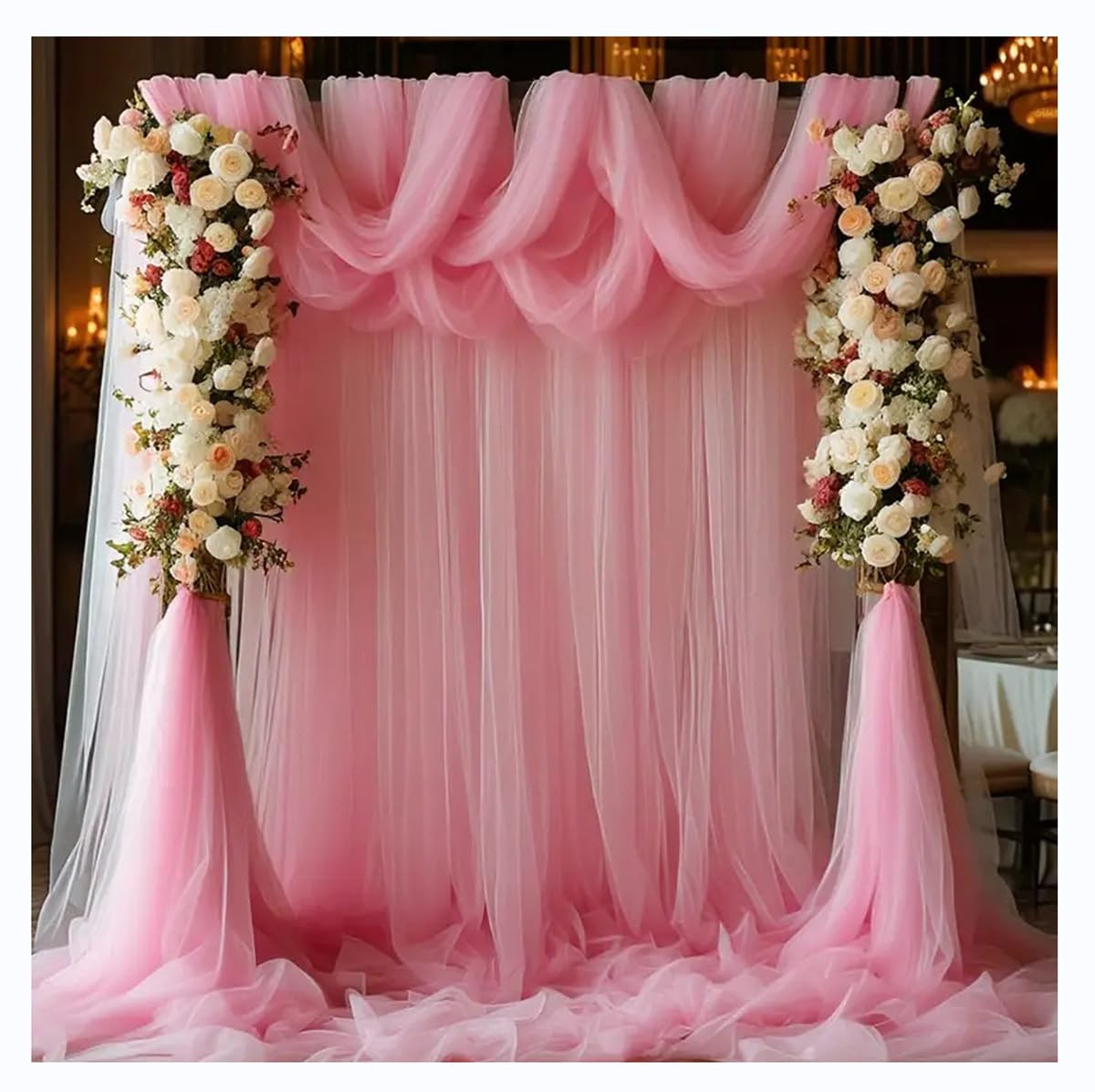 Rideau en gaze rose clair pour sublimer votre arche de mariage romantique