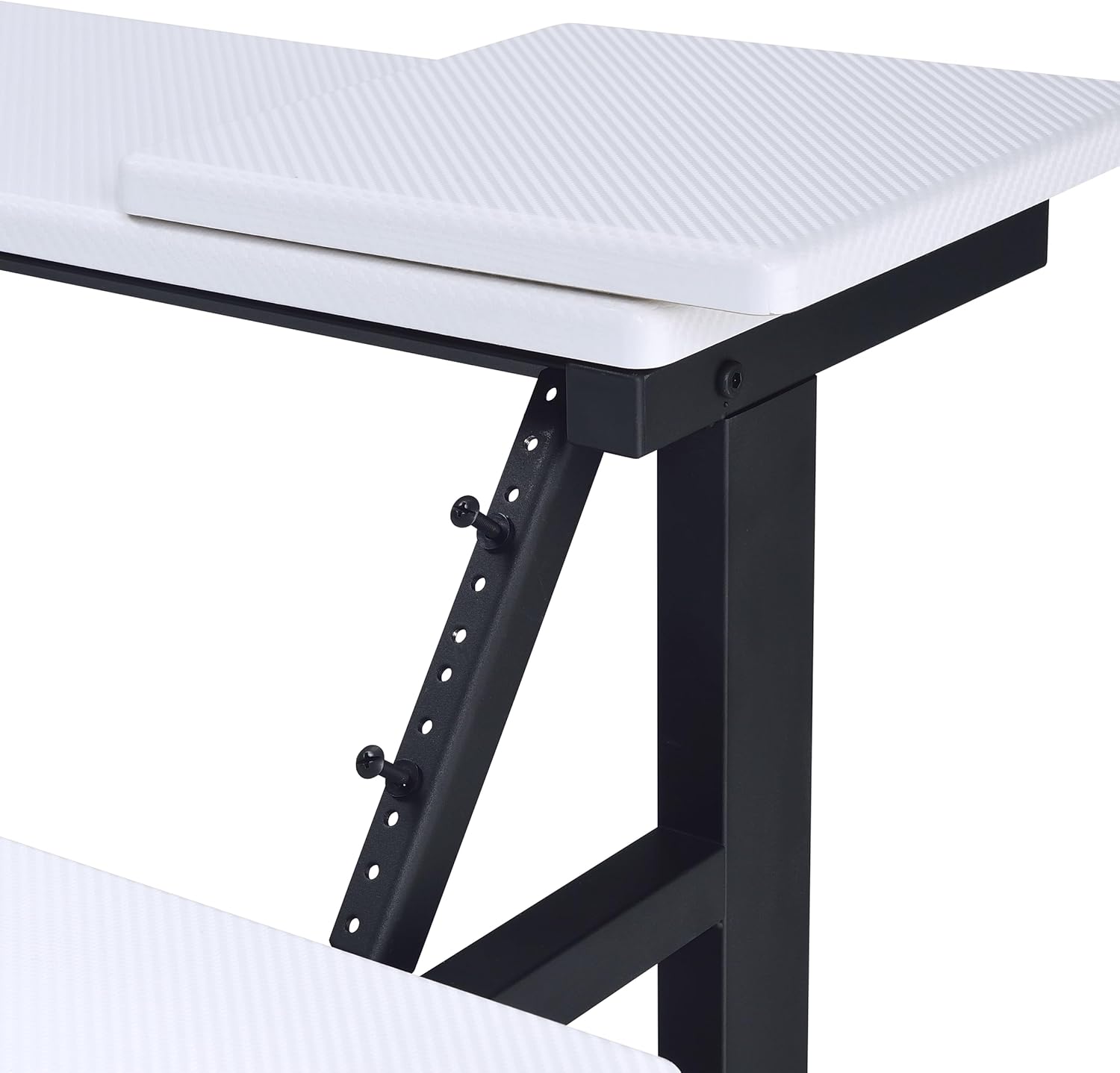 Close-up of the speaker riser on the upper shelf of the music desk.