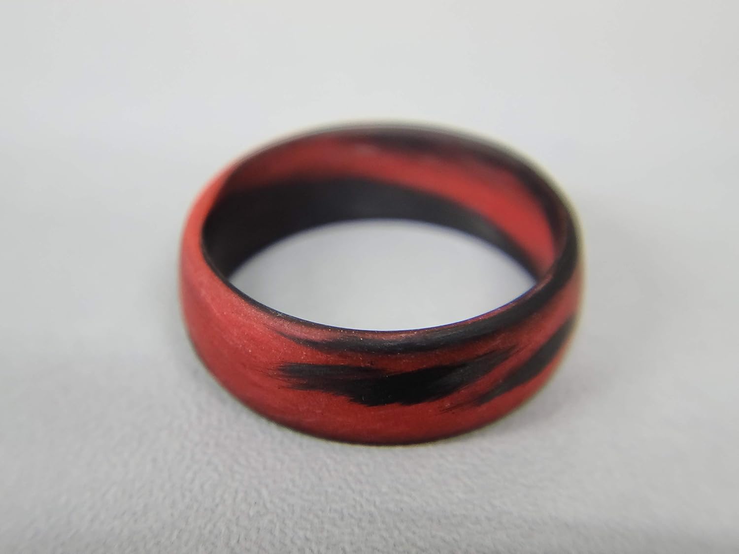 Carbon Fiber Red/Orange Marbled Glow Ring, Matte Finish, Glow-in-the-Dark, Durable, Waterproof, Sizes 4-16, Custom Bandwidths, Made in USA