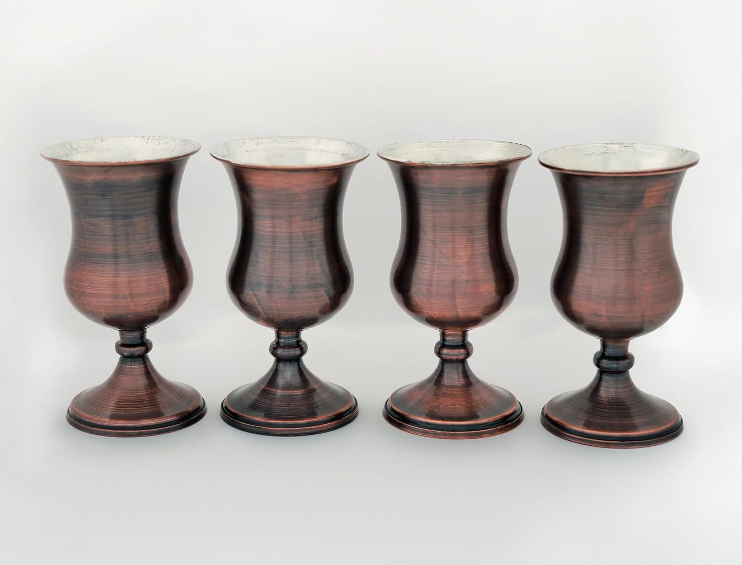 Premium Handcrafted Copper Water Goblets - Set of 4. Luxurious stemware for fine dining, perfect for enhancing any table setting with elegance and sophistication.