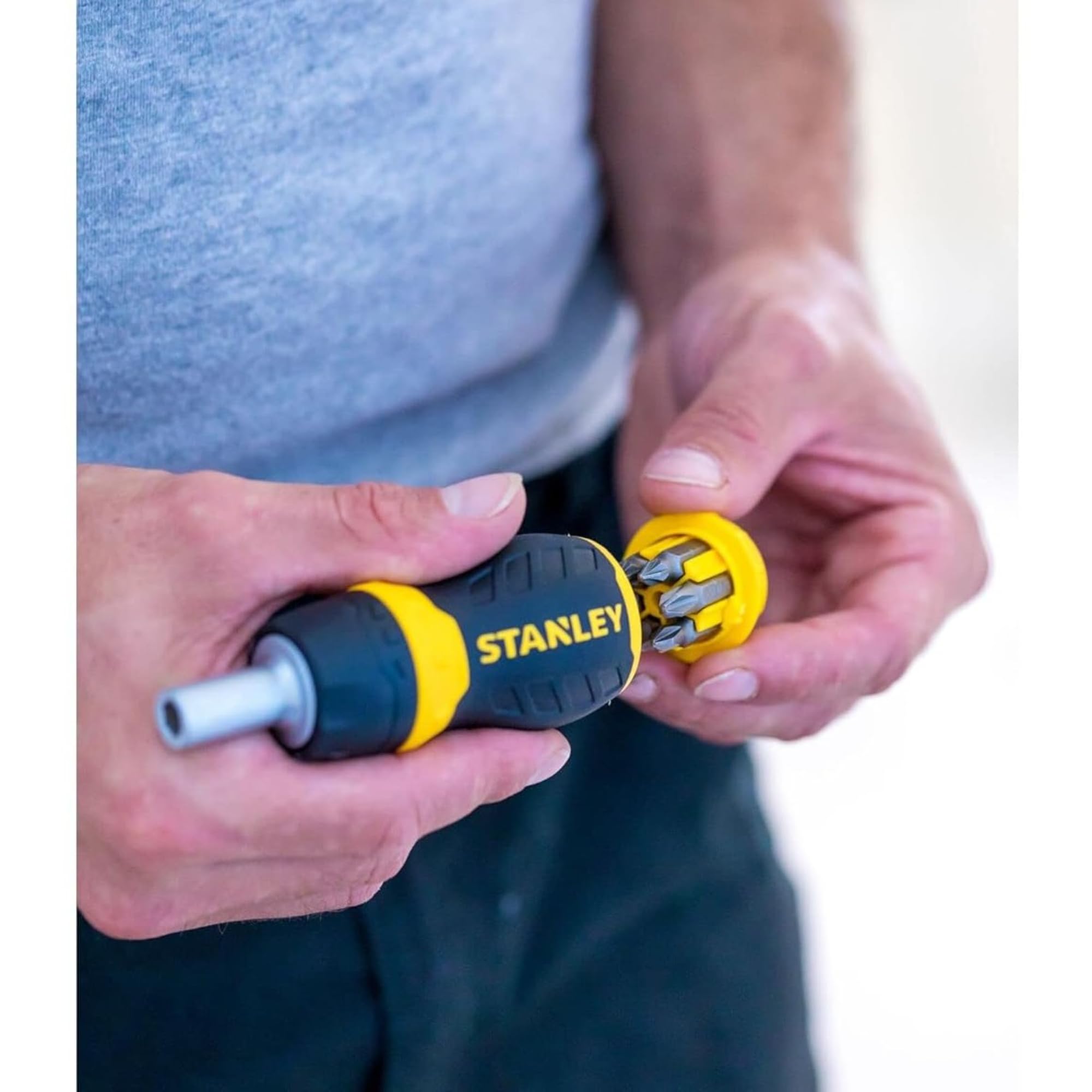 STANLEY 0-66-358 Multi-Bit Stubby Ratcheting Screwdriver, Comes with 6 Screwdriver Bits (PH1-PH2, PZ1-PZ2, Flared 4.5-6 mm), Magnetic Tip, Internal Bit Storage, Bi-Material Handle, Black & Yellow 1