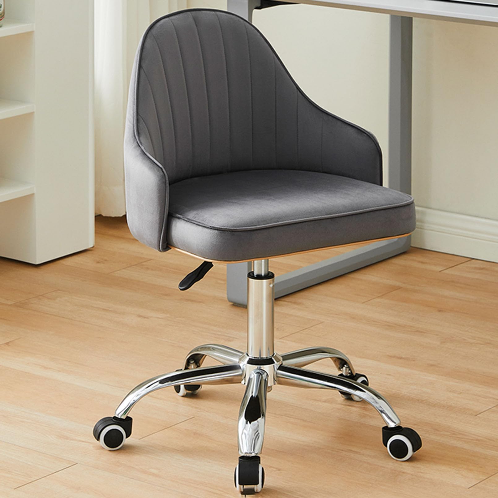 Chaise de bureau ergonomique velours au design épuré et robuste