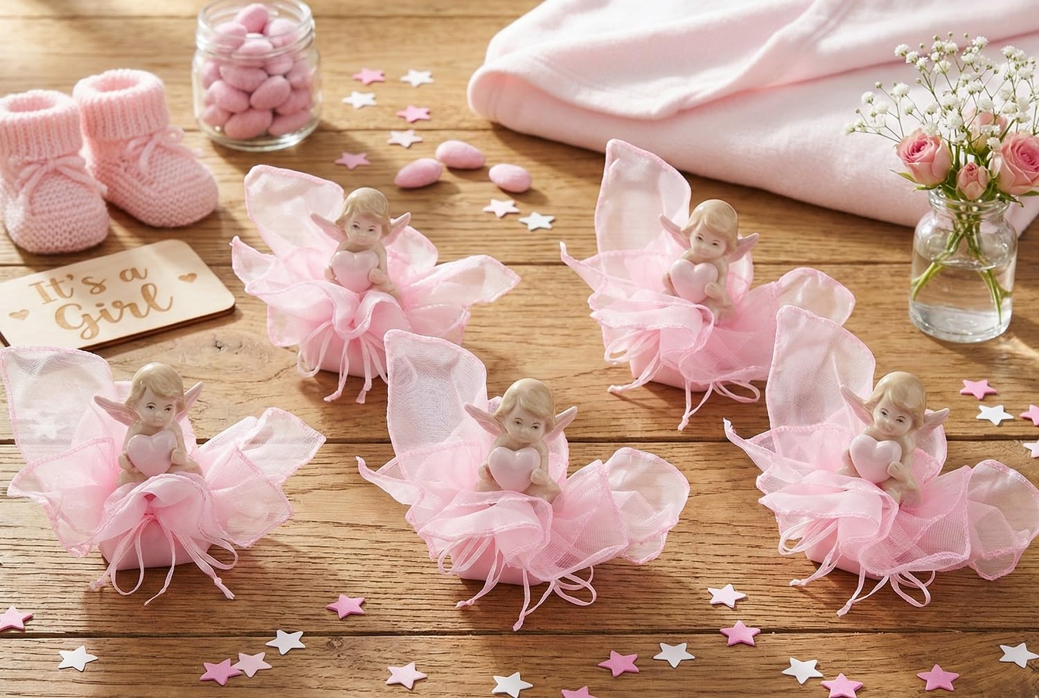 Sachets roses avec ange souvenirs de naissance pour invités
