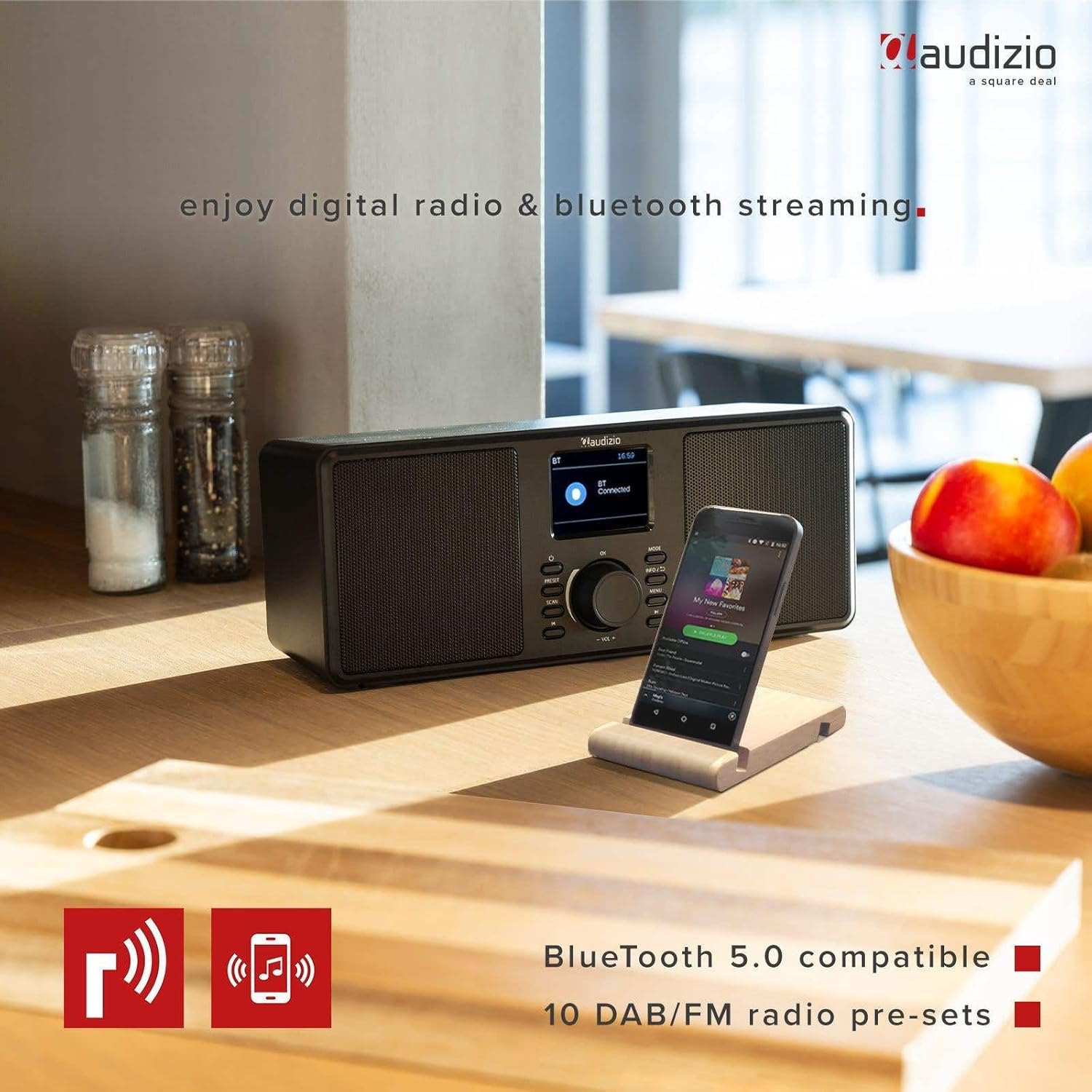 Audizio Monza DAB+ FM Radio with a smartphone connected via Bluetooth.