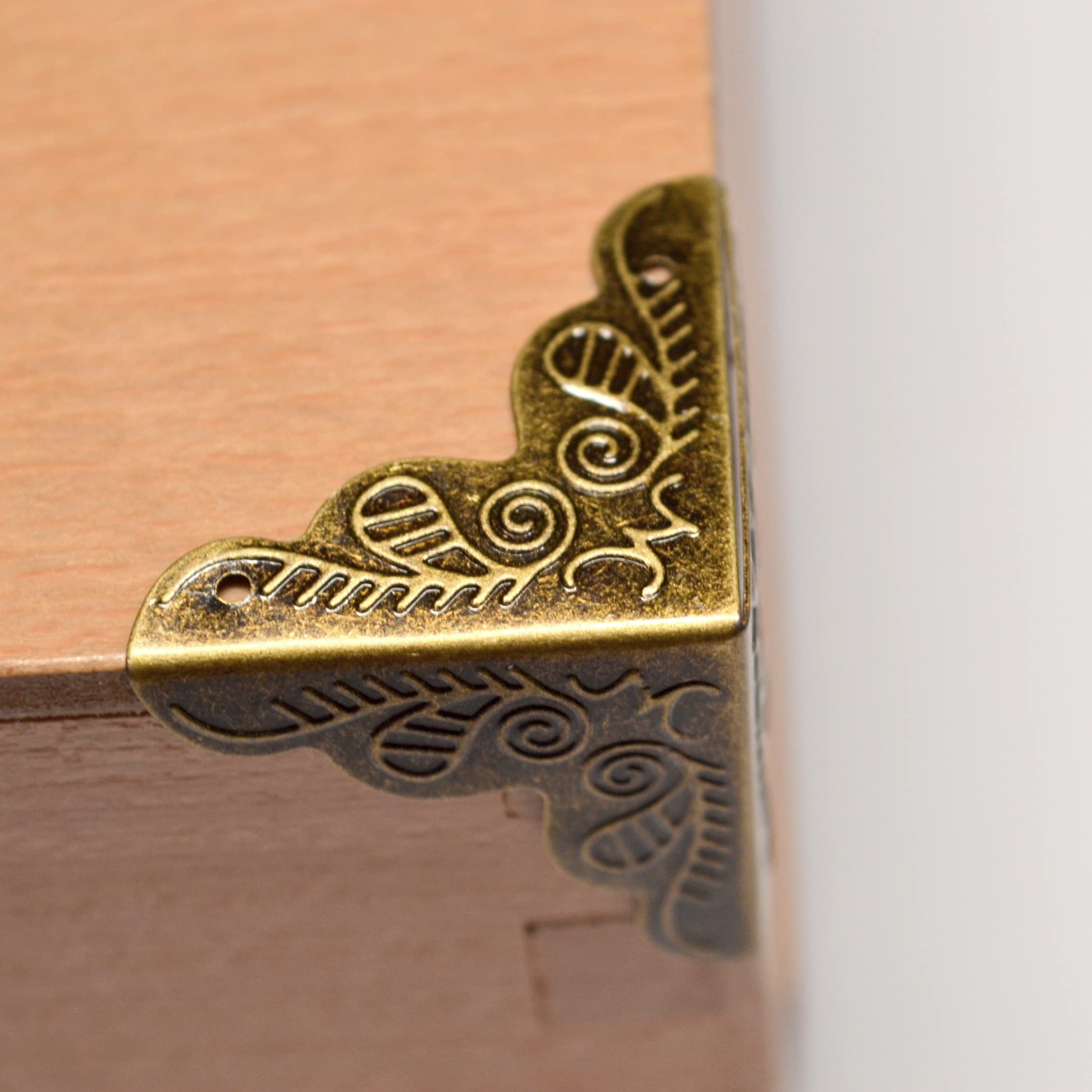 20 Pcs Vintage Bronze Corner Protectors Decorative Metal Edge Covers Antique Triangle Safety Guards Retro Right Angle Bracket with Nail for Furniture Jewelry Box Wood Case Small Size (Side Length:1") — Amazon image 3