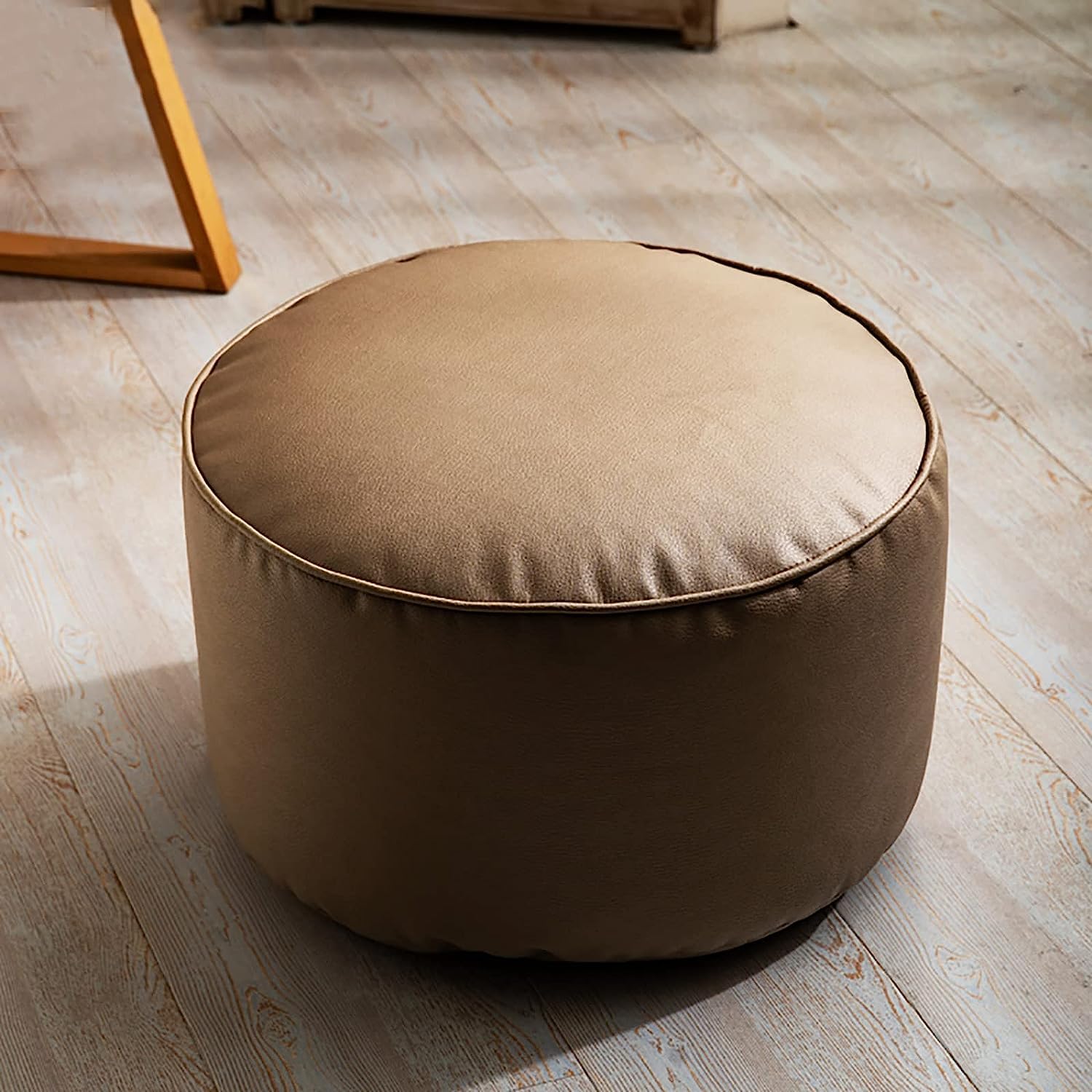 Pouf rond en cuir petit repose-pieds pour soulager les jambes lourdes au salon