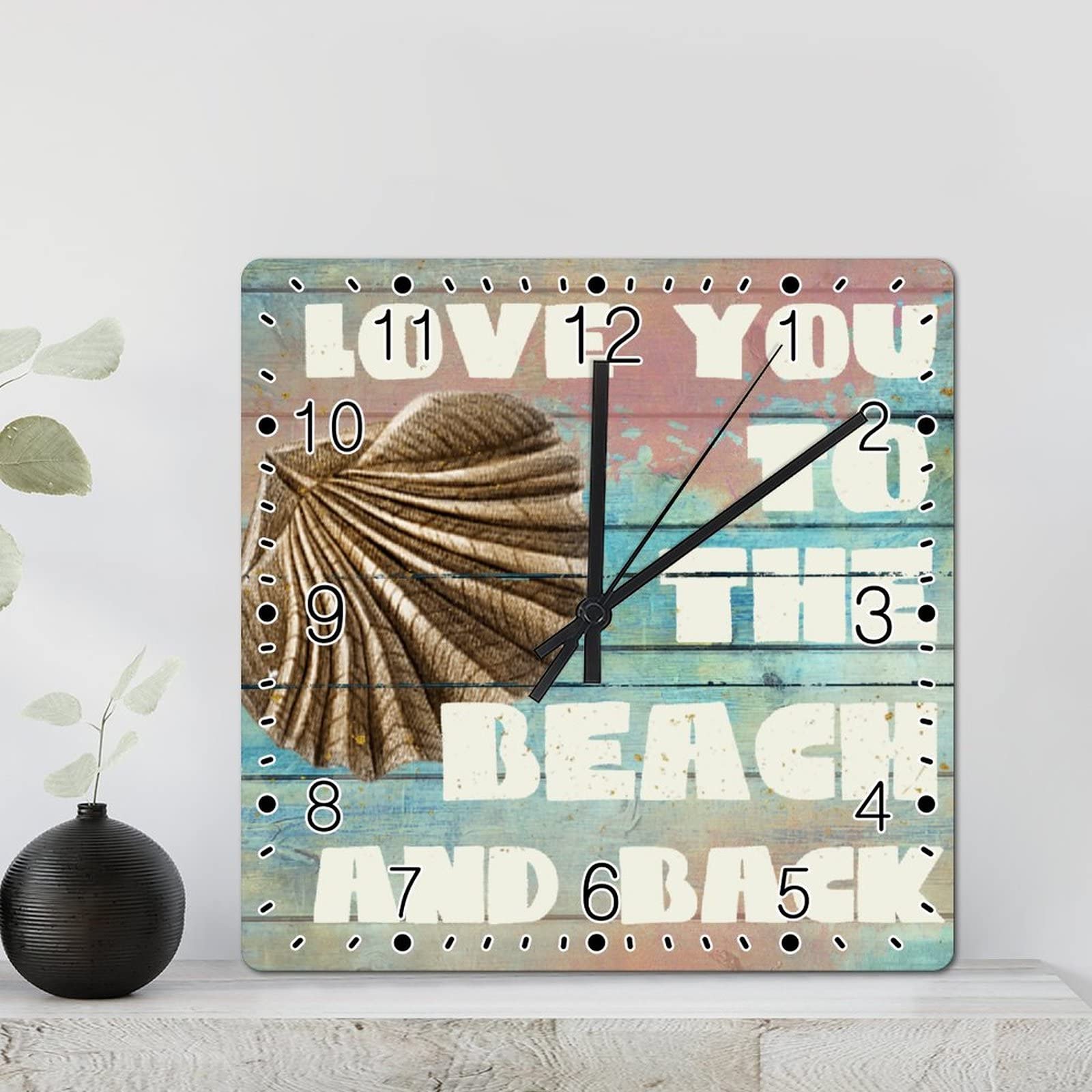 Horloge murale conque de plage sans tic-tac pour retrouver le calme dans votre bureau