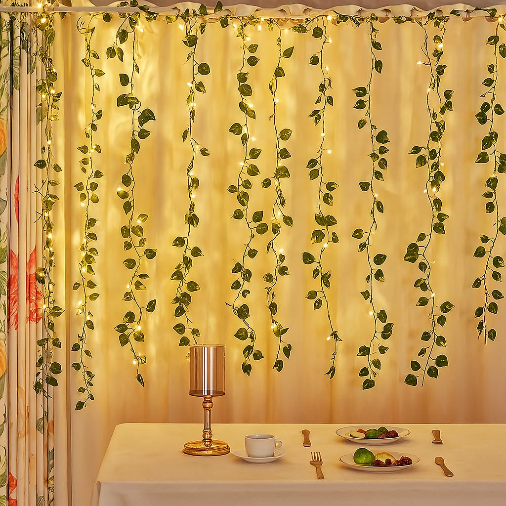Gesto Artificial Leaf Curtain LED String Lights – Warm White Fairy Lights with 8 Modes Controller, AC Plug for Home,Room,Wall,Birthday, Wedding & Diwali Decoration, Green Leaf Hanging Lights (10×3 Ft) Gesto Artificial Leaf Curtain LED String Lights – Warm White Fairy Lights with 8 Modes Controller, AC Plug for Home,Room,Wall,Birthday, Wedding & Diwali Decoration, Green Leaf Hanging Lights (10×3 Ft)