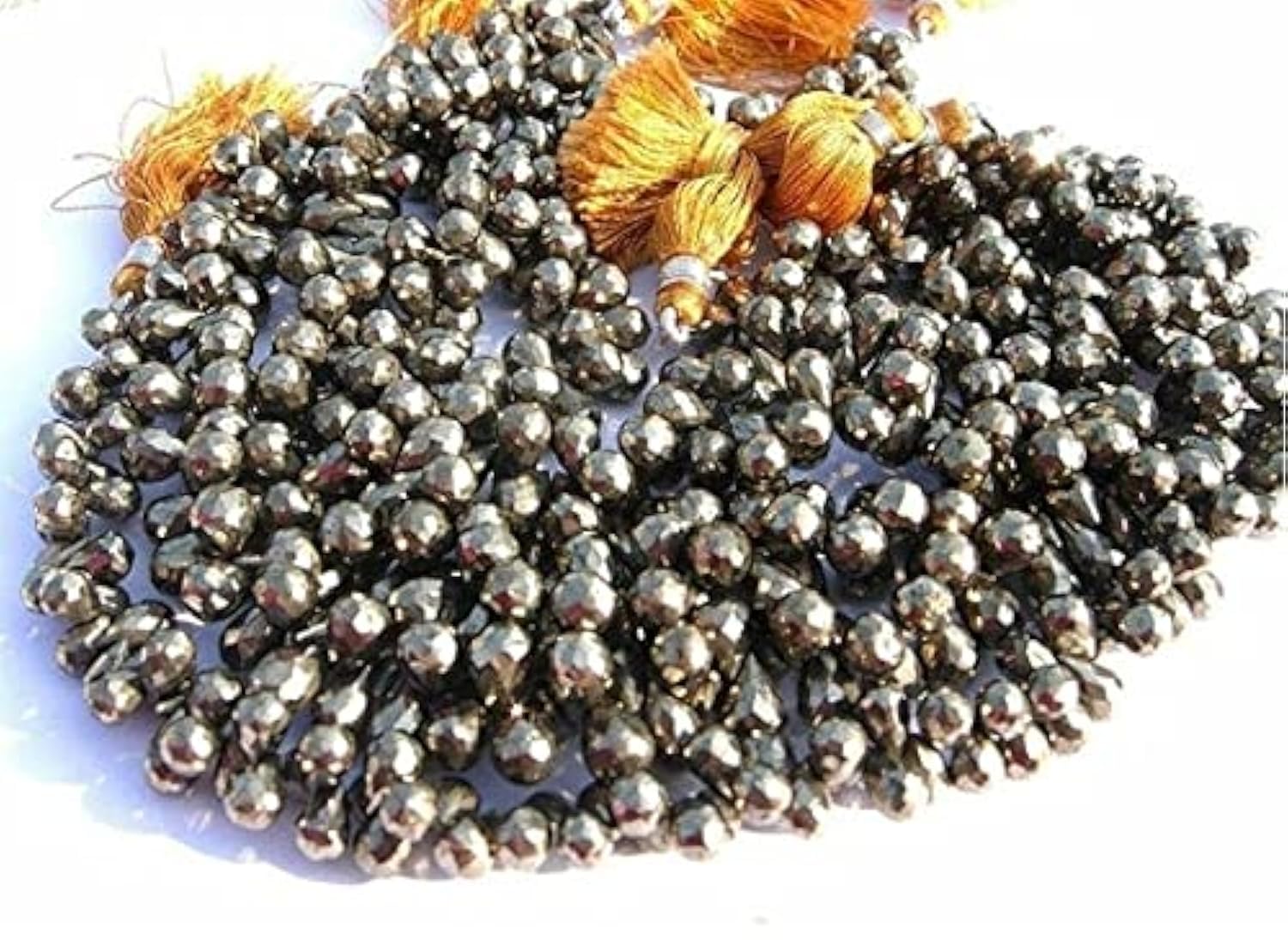 Pyrite micro facettée en briolette 7x5mm pour enfilage de perles