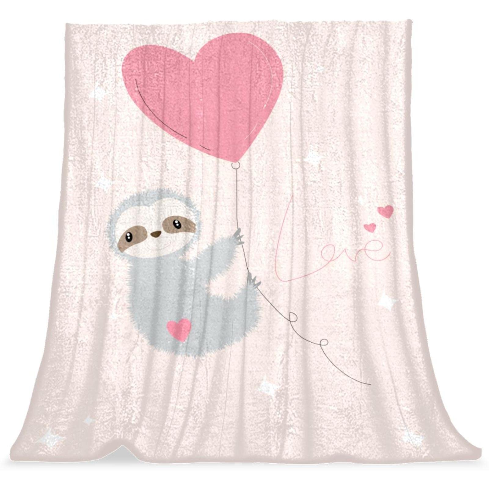 Couverture de lit paresseux rose pour des moments lecture douillets