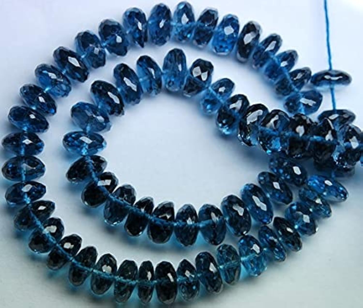 Perles London Blue topaze rondelles facettées 7mm pour création de bijoux artisanaux