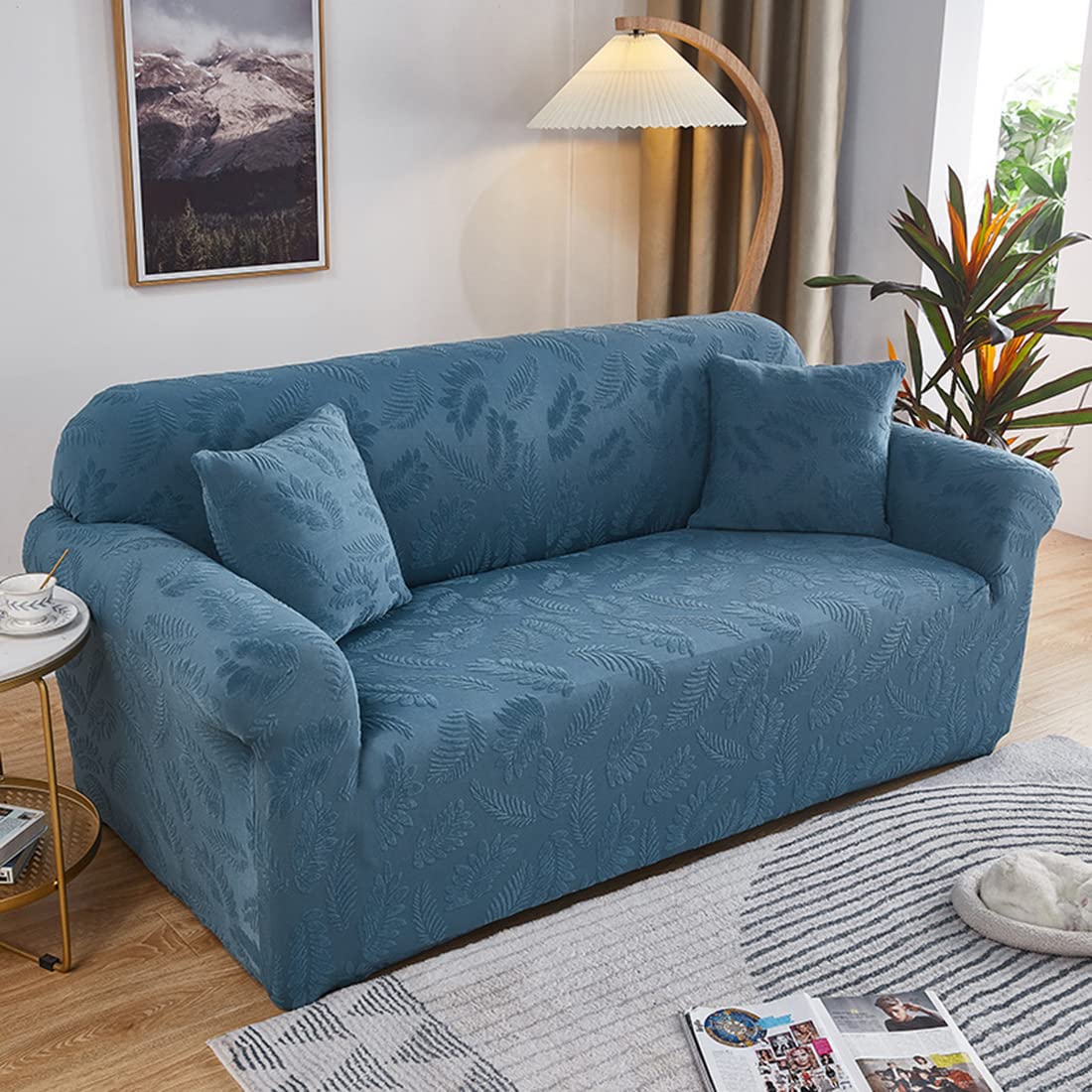 Housse de canapé damassée bleu pour un salon élégant