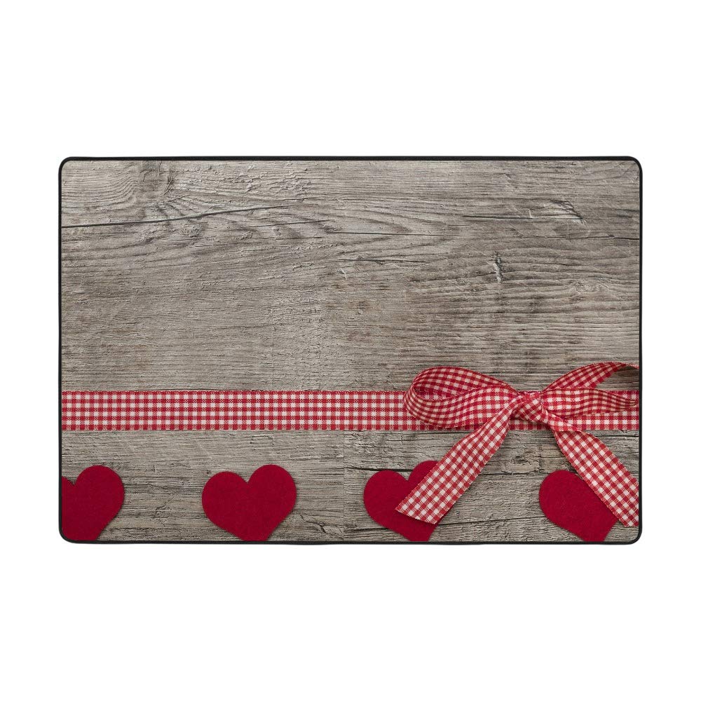 Grand tapis avec nœud rose Ruchen en velours pour sublimer votre salon en bois