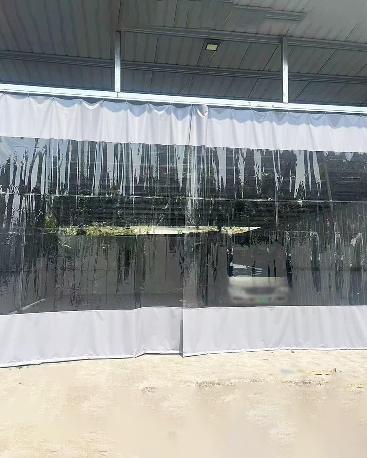 Rideau de garage en vinyle isolant sur rail coulissant transparent de taille 5x2,2m