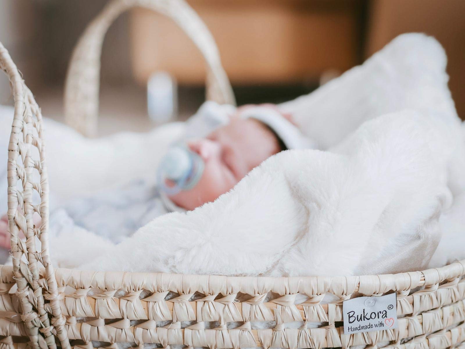 Mosesbag Babytasche geflochten