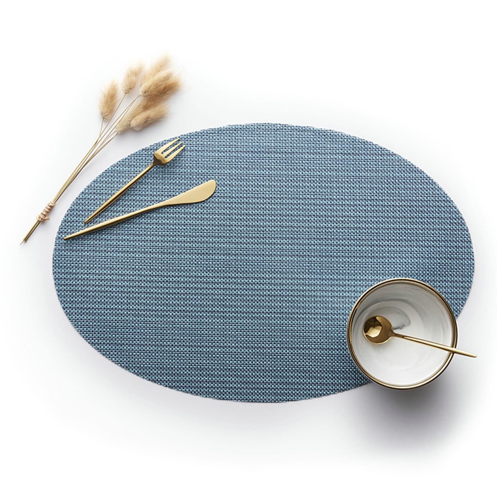 Set de table ovale en PVC bleu idéal pour sublimer vos dîners de famille