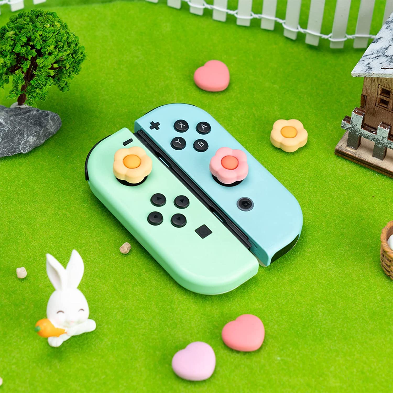 GeekShare Lindas Tapas de Silicona para Agarre del Pulgar Joycon, Cubierta de Joystick Compatible con Switch/OLED/Switch Lite, 4 Piezas - Corazón y Flor