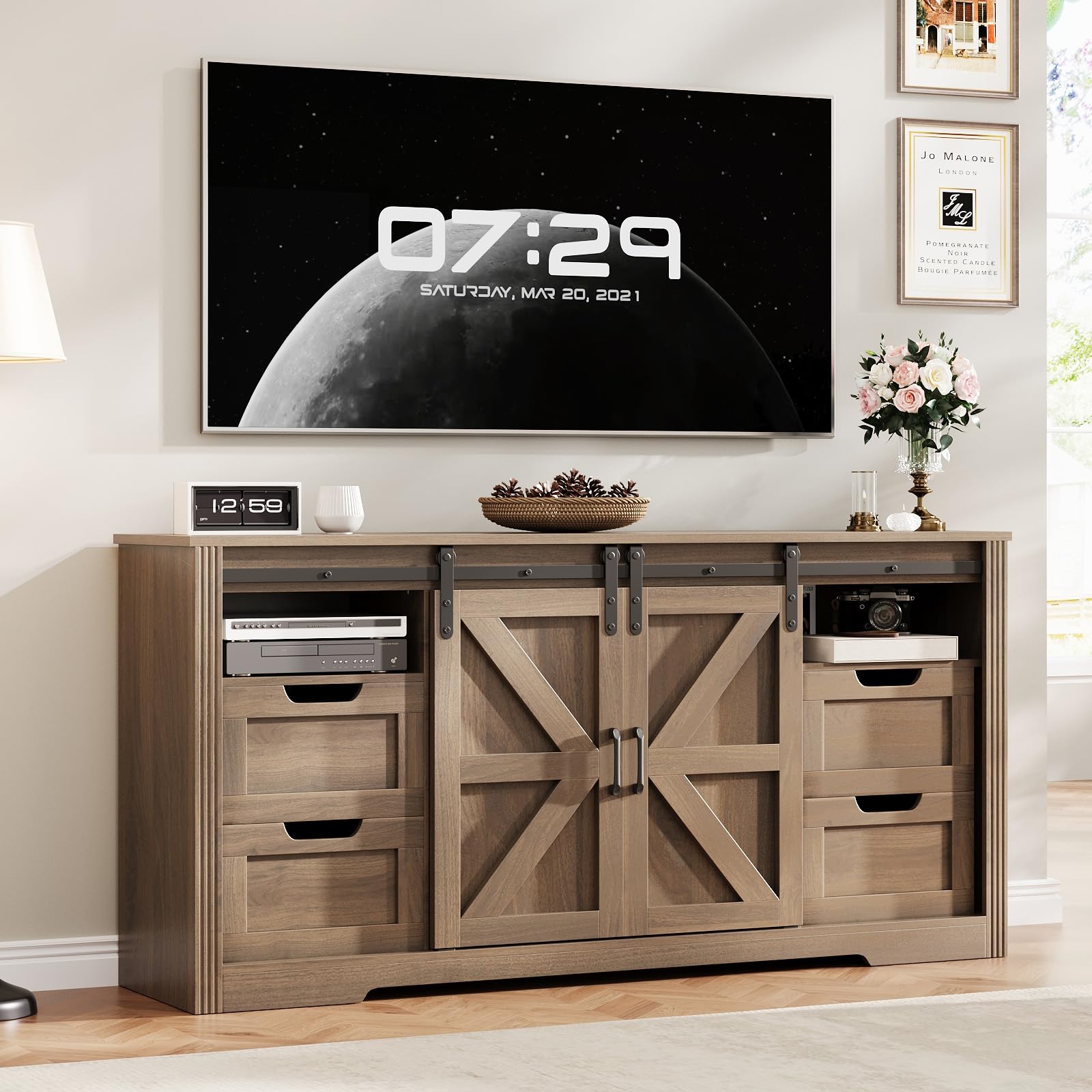 Assembled Garvee Farmhouse TV Stand in Walnut finish, supporting a large television.